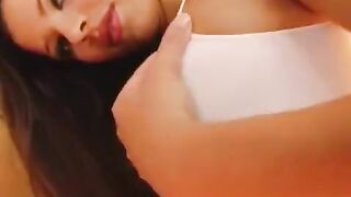 A nice girl plays with her big vagina using a dildo