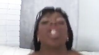 A black woman gave a white guy an intense blowjob, showcasing passion