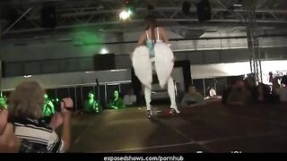 A girl learned to work with a stripper pole in sexy clothes