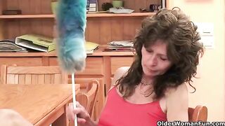 A mature woman plays with her pussy using a sex toy in this hot video