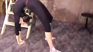 The flexible gymnast has excellent stretching skills, perfectly showcased in this hot scene