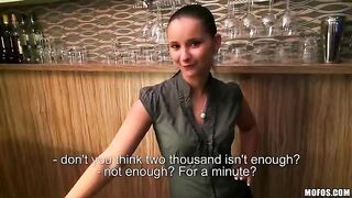 The pretty girl is working as a bartender and she is doing it well