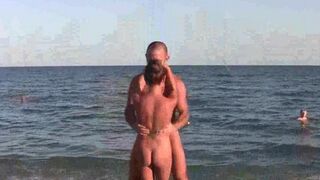 Nudist girl practices acrobatics on the naked beach