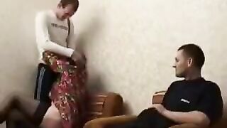 A mother, drunk and horny, gets intimate with her son and his friend