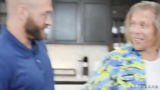 A girl gets attention from two guys and she likes it very much