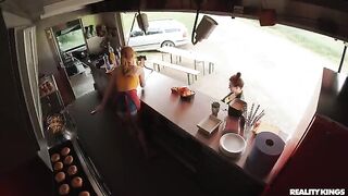 The red-haired beauty is fucked on the kitchen table by a passionate guy