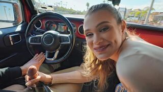 Handjob with a cute girl in the car. She's not embarrassed