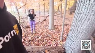 A girl is having fun with her boyfriend in the park, getting intimate