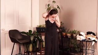A new outfit is tried on after buying new clothes