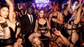 The guy has sex with girls on the playground, wearing latex
