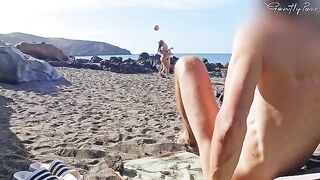 Two girls got fucked by a guy on a nude beach, barely avoiding getting caught