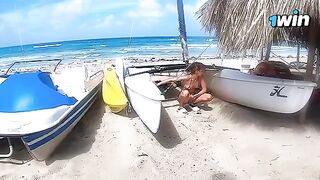 A couple enjoys passionate and rough sex on the naked beach