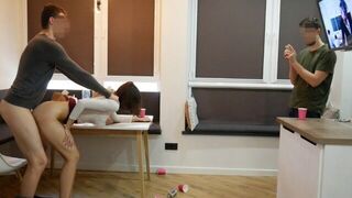 A girl is being fucked by her boyfriend's friends in a steamy scene