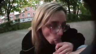 A girl is sucking her stepbrother’s cock right in the street