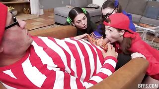The guy is having fun with four girls at once on the couch