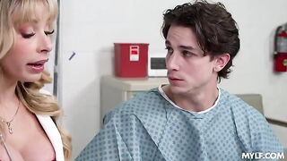 A blonde in a hospital setting, engaging in intimate acts with others involved