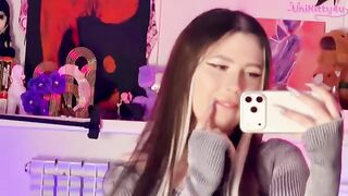 A girl caressed herself with a mirror, embodying the alternative vibe