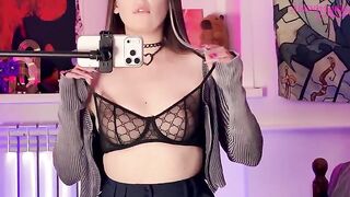A girl caressed herself with a mirror, embodying the alternative vibe