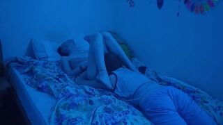 The couple has hot sex in the bedroom with neon lights on