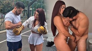 The girl is having fun with her coach in the gym, getting sweaty