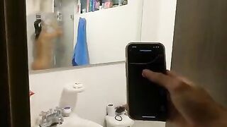 Martina Smith attempts to hold back during the Squirt Challenge in public