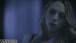 Hot brunette and blonde in a dark, passionate threesome scene with intense energy